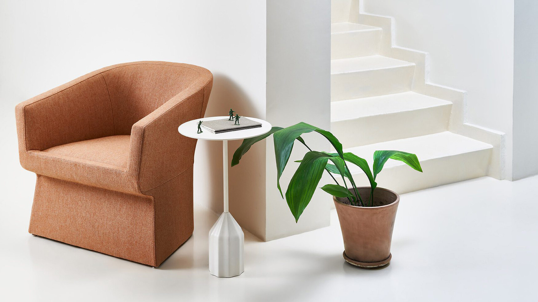 Viccarbe Burin Circular Mini Side Table White Finish With Chair In Lounge Setting