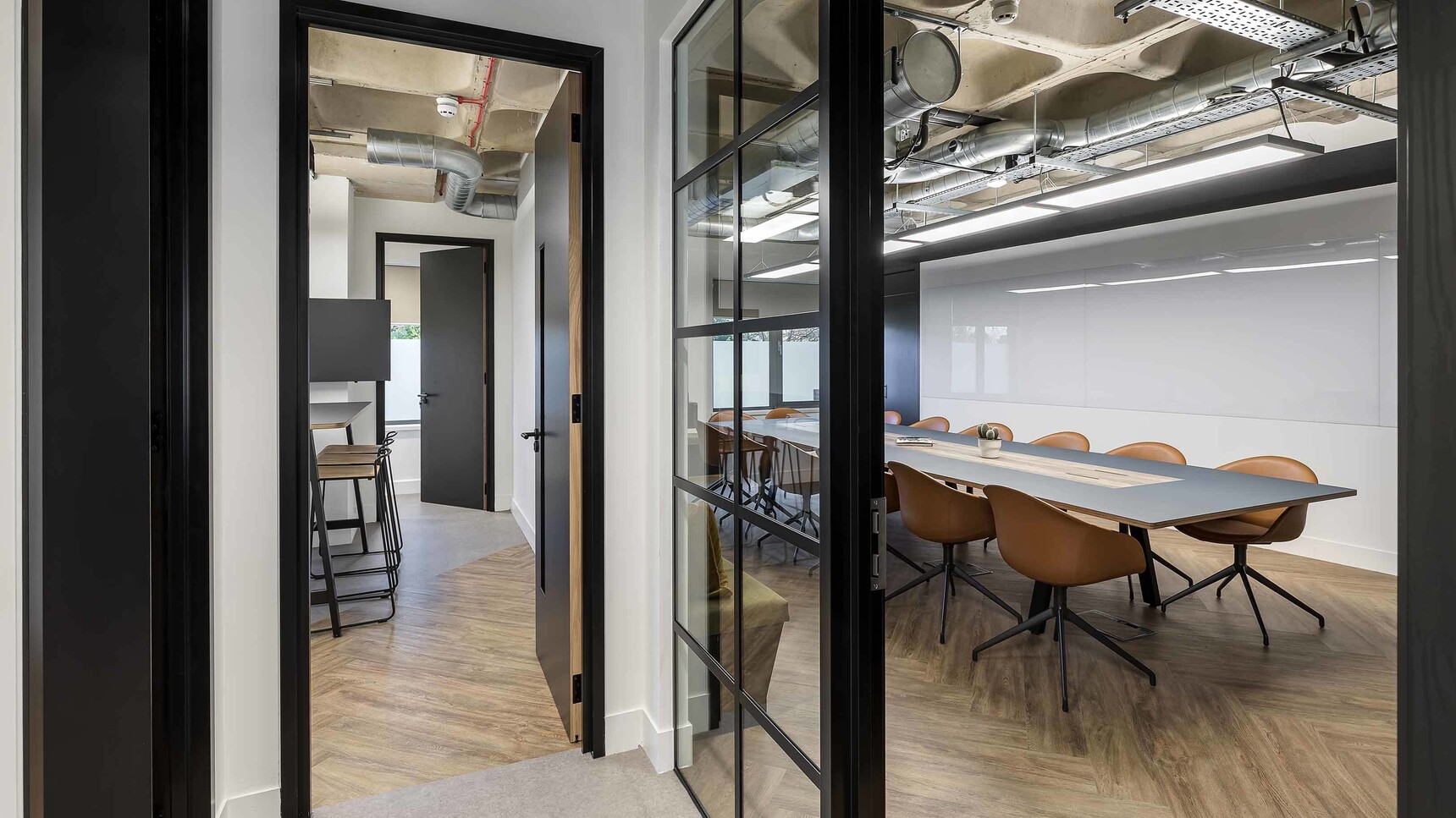 Workbench A-Star Rectangular Laminate Black With Metal Frame In Office Setting