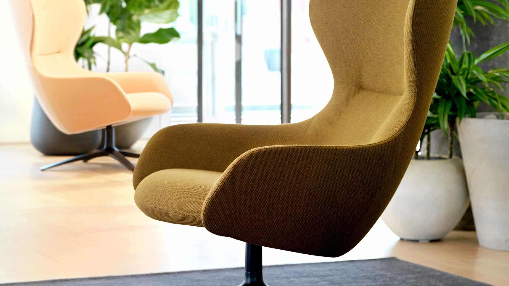 Boss Design Amelia Wingback Lounge Chair With Aluminium Four Star Base Black Finish In Office Setting