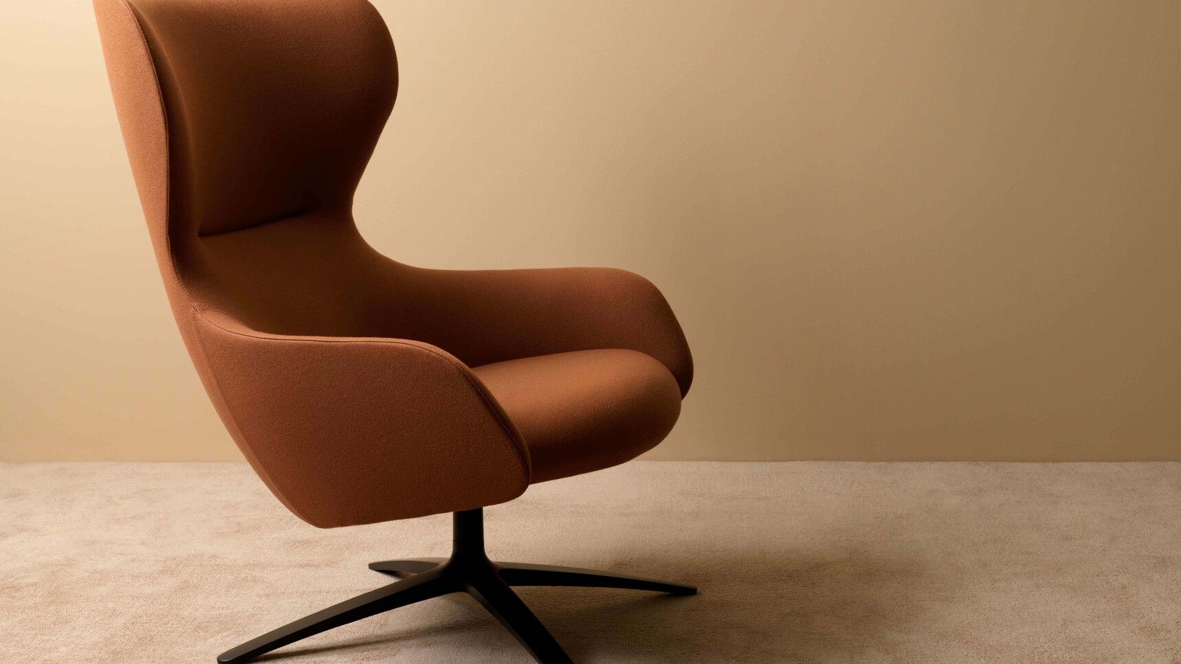 Boss Design Amelia Wingback Lounge Chair With Aluminium Four Star Base Black Finish In Situ Image