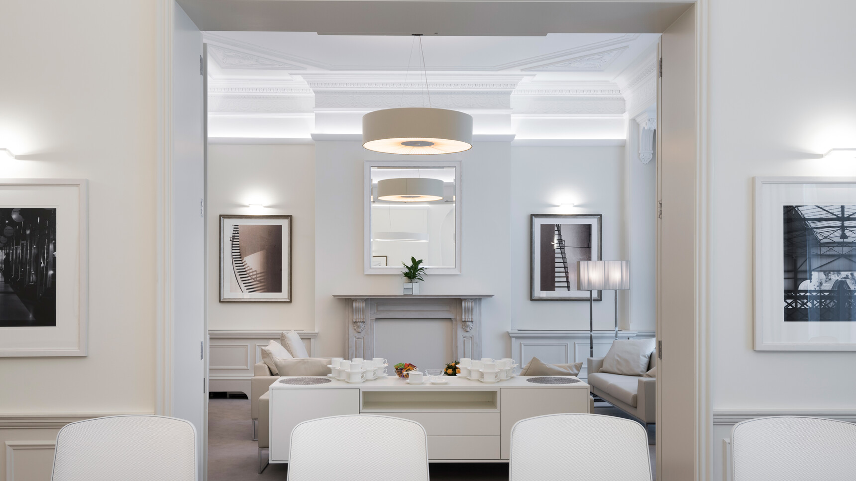 Four Boss Design Trinetic Upholstered Office Chairs With White Upholstery And Sofas And Credenza In White Upholstery And Finish