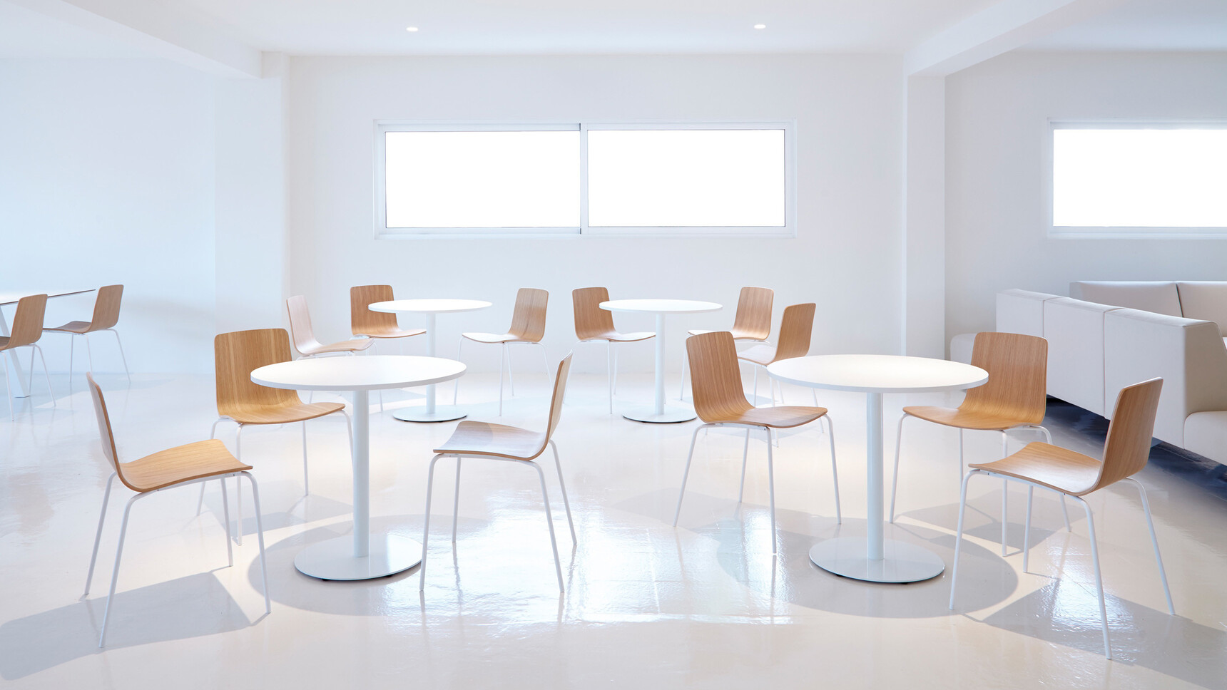 Viccarbe Stan Circular Low Tables White Finish In Office Setting