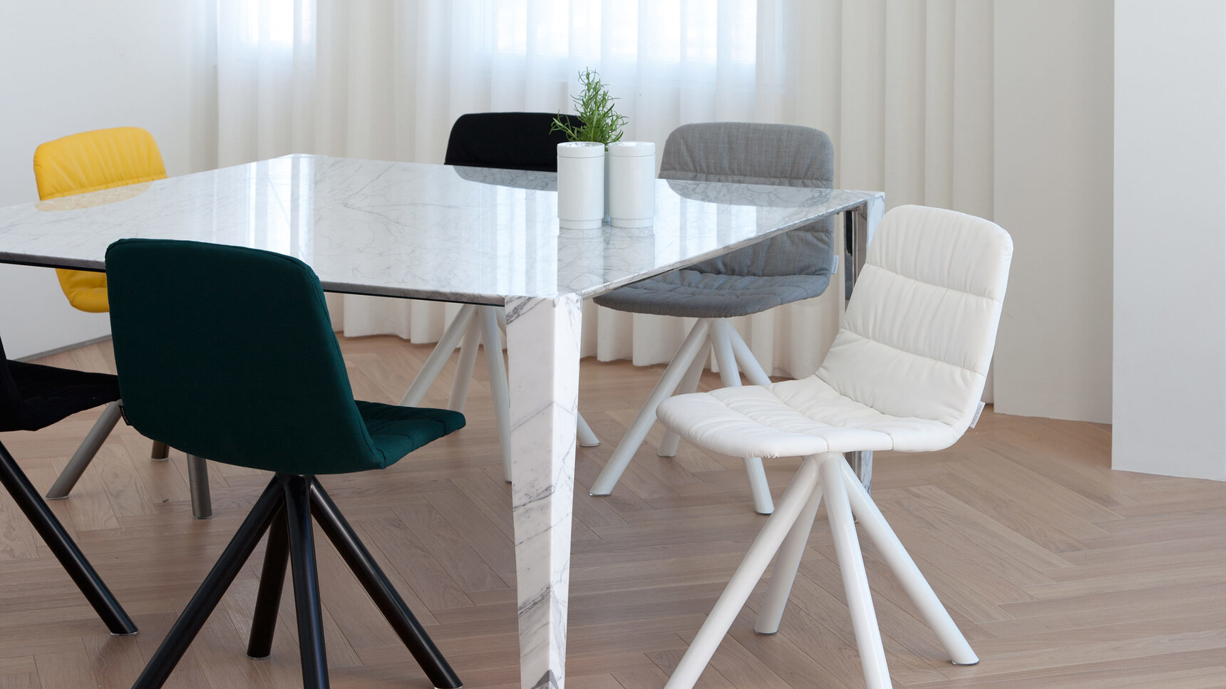 Viccarbe Maarten Soft Upholstered Chairs With Metal Swivel Bases At Table Family Image