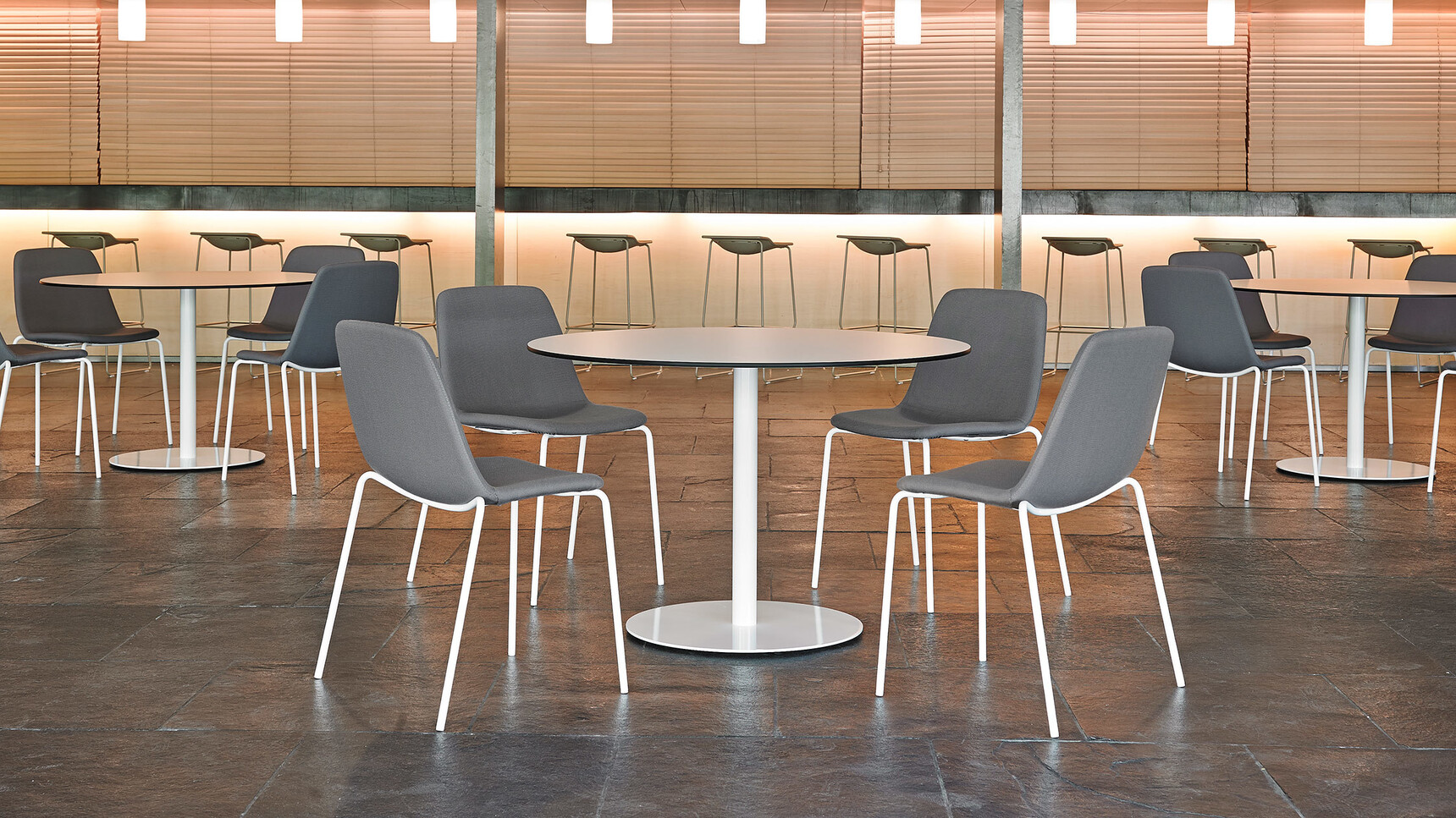 Viccarbe Maarten Smooth Upholstered Chairs With White Finish In Office Setting