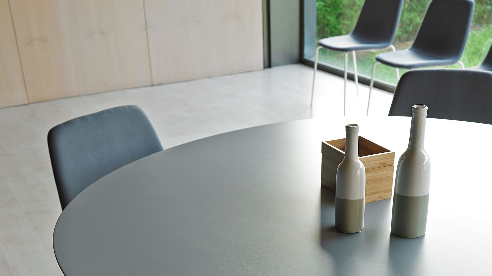 Viccarbe Maarten Smooth Upholstered Chairs At Table Detail Image