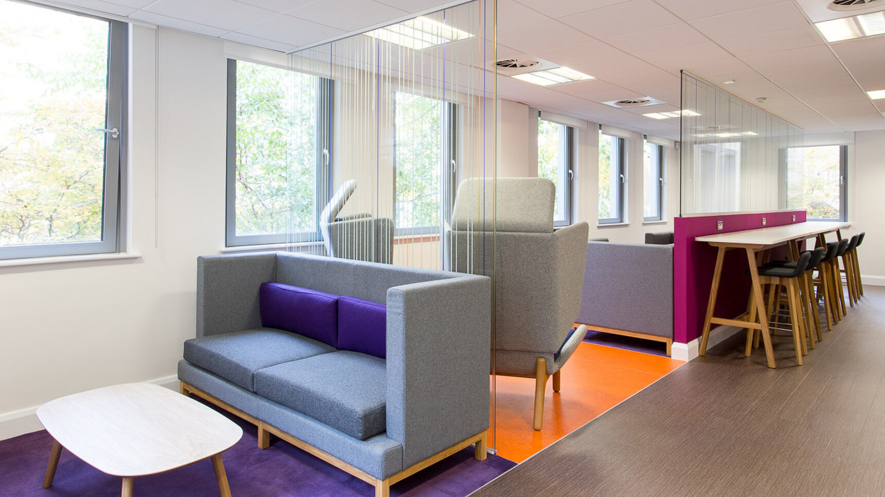 Three Boss Design Arthur Large Sofas In Light Blue Upholstery With Wood Base Finishes And Blue Cushions At Coffee Table With Two Boss Design Chairs In Light Blue Upholstery With Wood Base Finishes