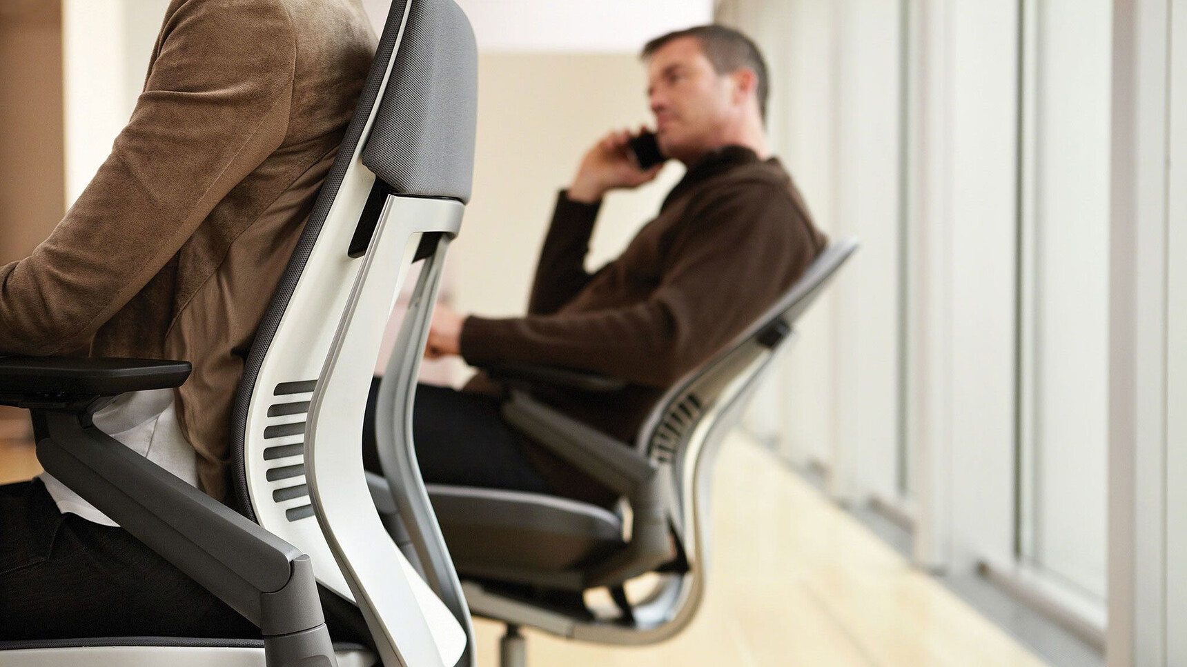 Steelcase Gesture Shell Back Office Chair White Upholstery Black Frame Armrests In Use Gesture Wrapped Back Office Chair Black Upholstery White Grey Frame