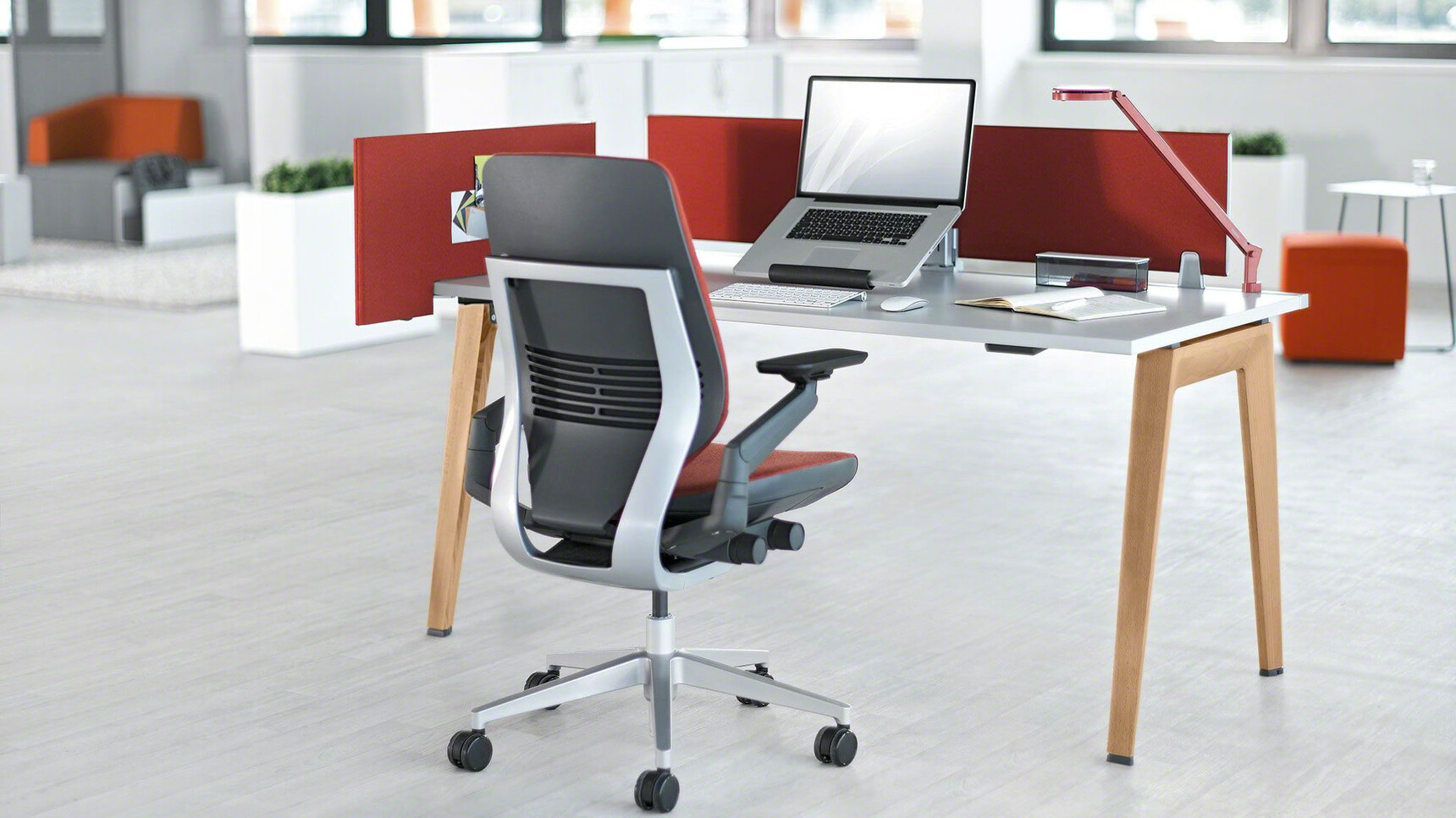 Steelcase Gesture Shell Back Office Chair With Dark Red Upholstery And Black Grey Frame And Black Arms And Grey Base Finish On Castors At Desk In Office Environment
