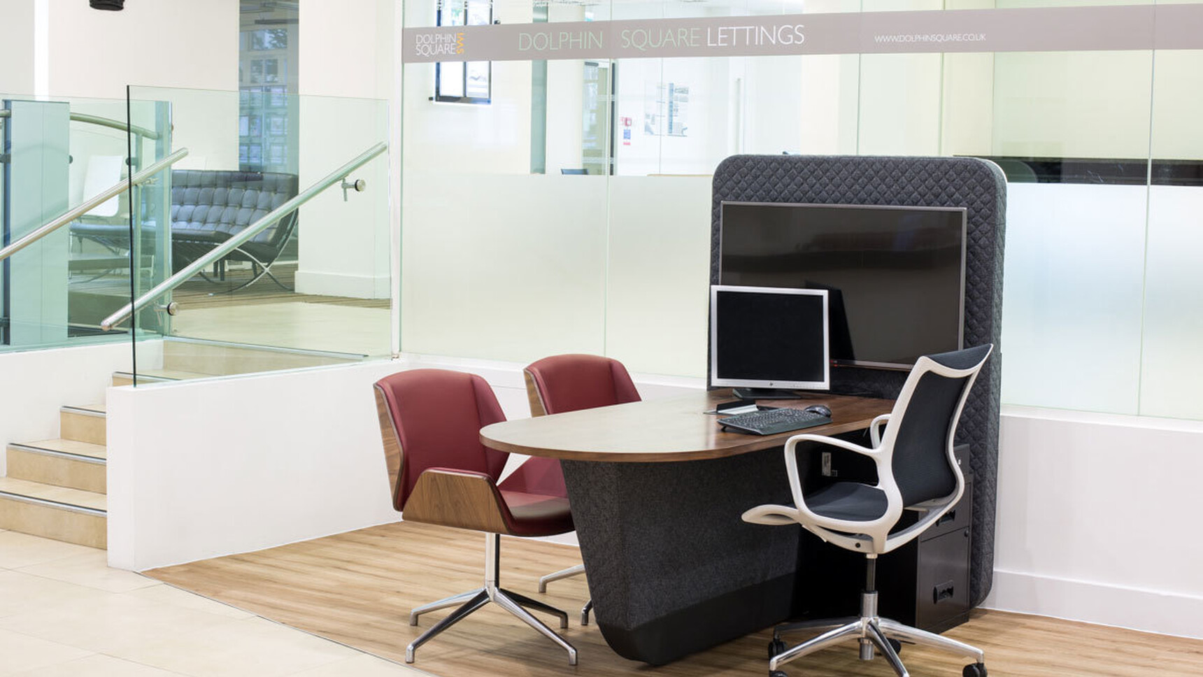 Boss Design Kara Office Chairs with Arms In Black Upholstery With White Frame And White Armrests And Polished Aluminium Base On Castors And Two Kruze Lounge Low Back Chairs With Wood Frame And Dark Red Upholstery