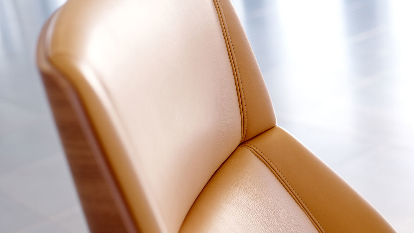 Boss Design Kruze Lounge High Back Chair With Orange Leather Upholstery And Wood Frame Detail Image