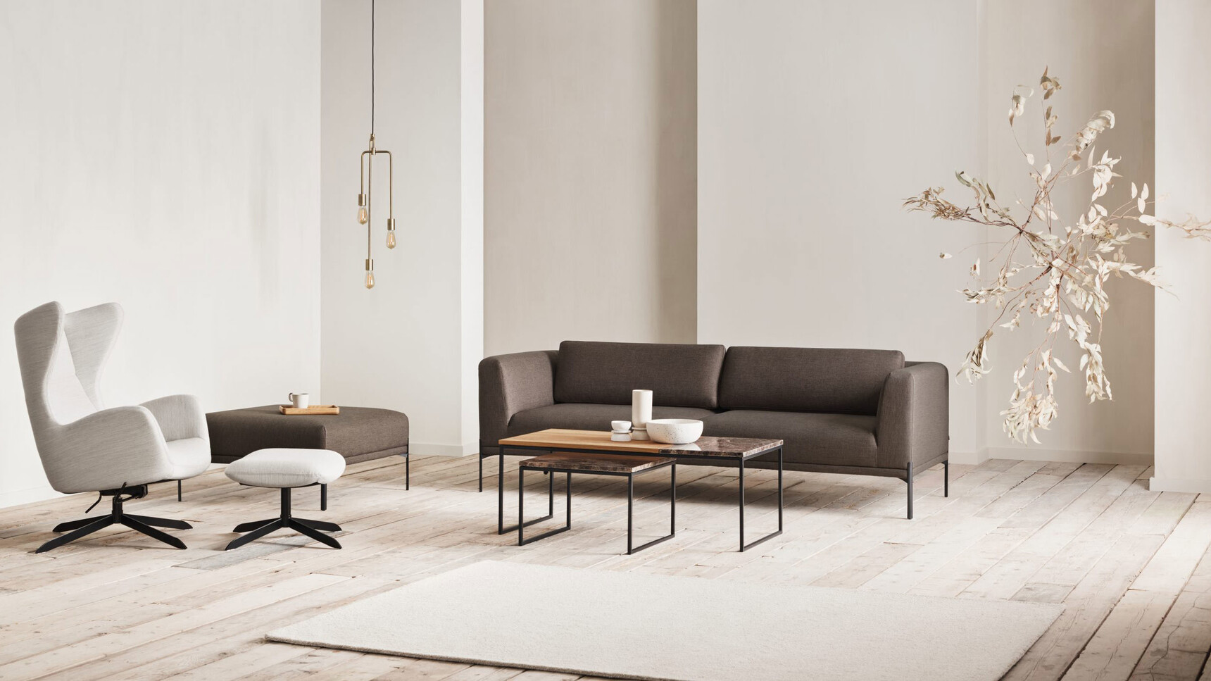 Bolia Solo Lounge Armchair With Sofa In Lounge Setting