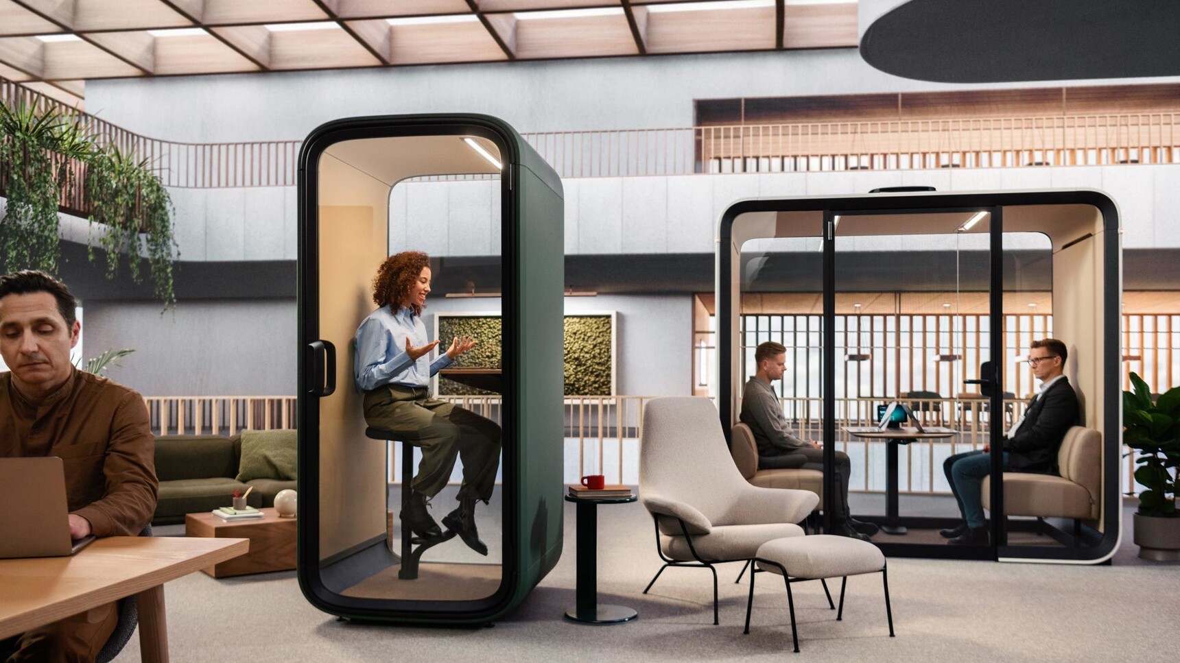 Framery Four Meeting Pod White Finish and One Compact Midnight Moss In Office Setting