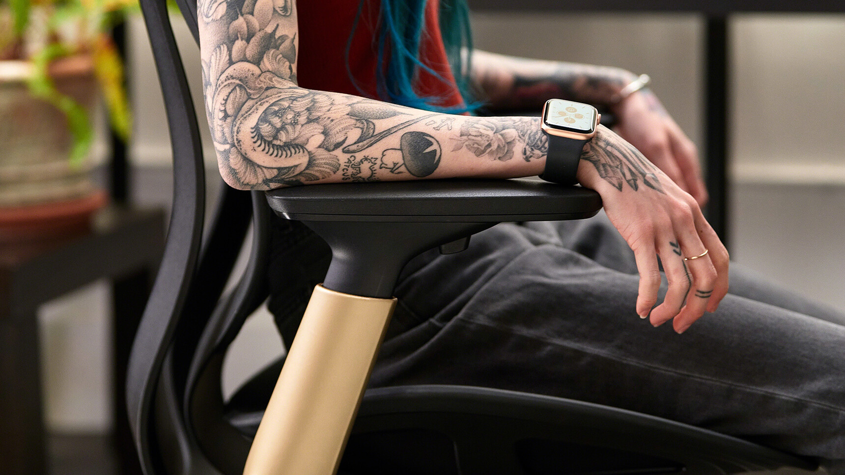 Steelcase Karman Office Chair Lux Finish With User Matte Brass Arms Detail Image