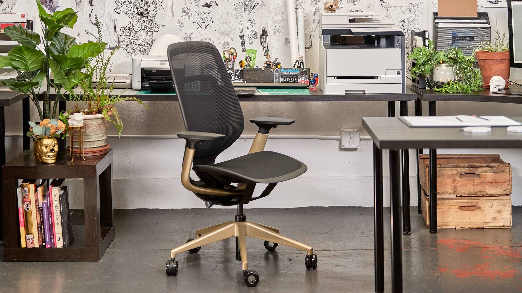 Steelcase Karman Office Chair Lux Finish Black Upholstery Matte Brass Finish At Desk Detail Image