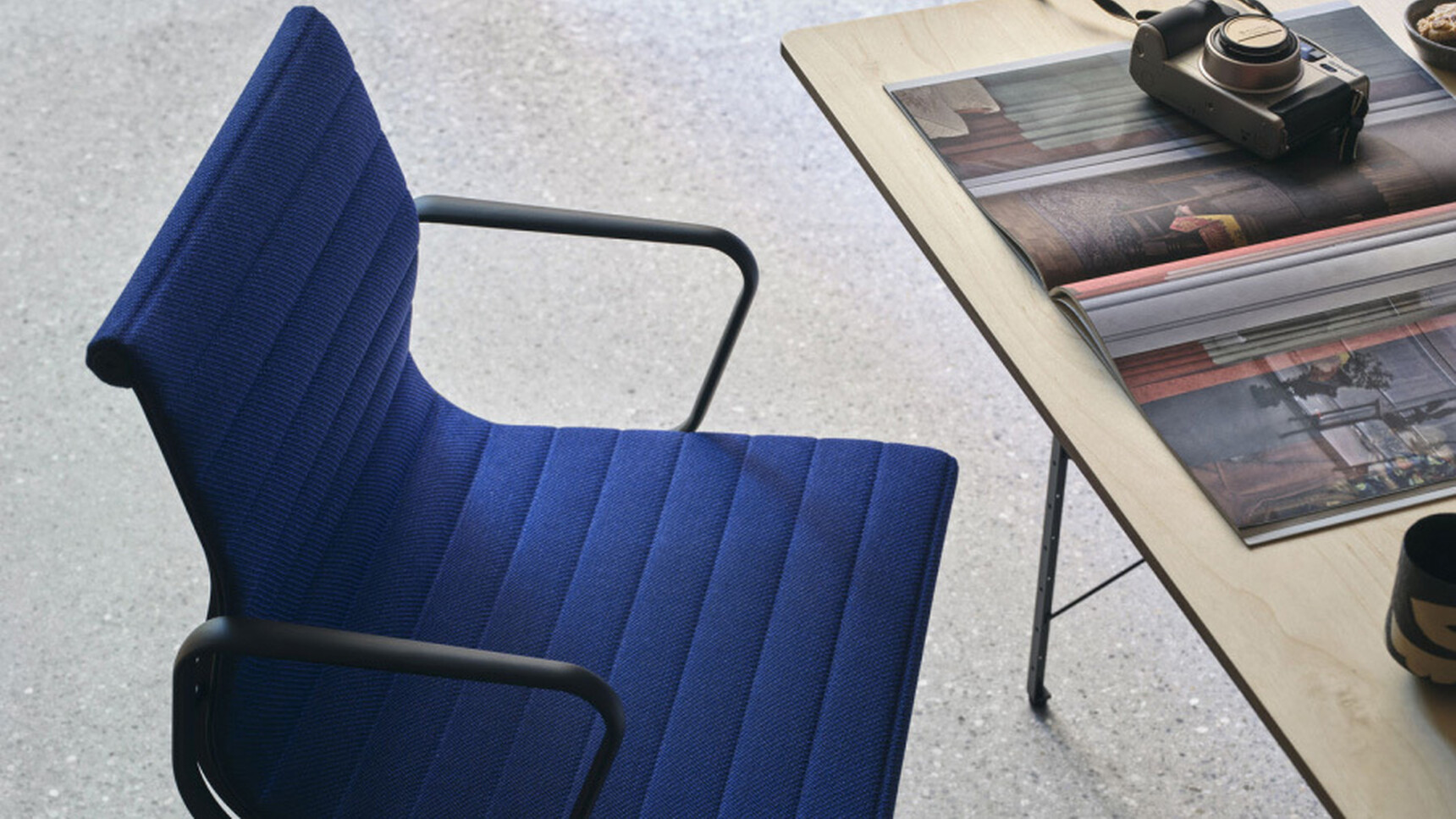 Vitra Charles & Ray Eames Aluminium EA132 Chair Blue Upholstery Detail Image