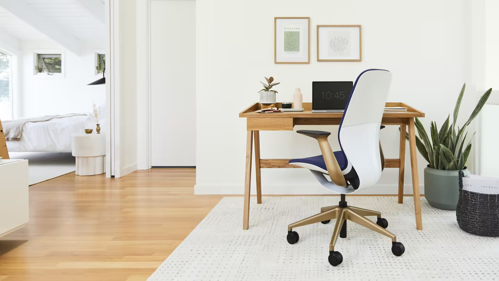 Steelcasae SilQ Upholstered Office Chair Lux Edition At Desk Family Image