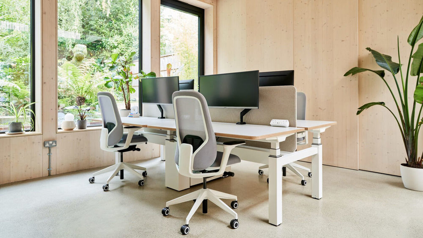 Workstories B22 Office Chairs Grey White Frame At Height Adjustable Desk In Office Setting