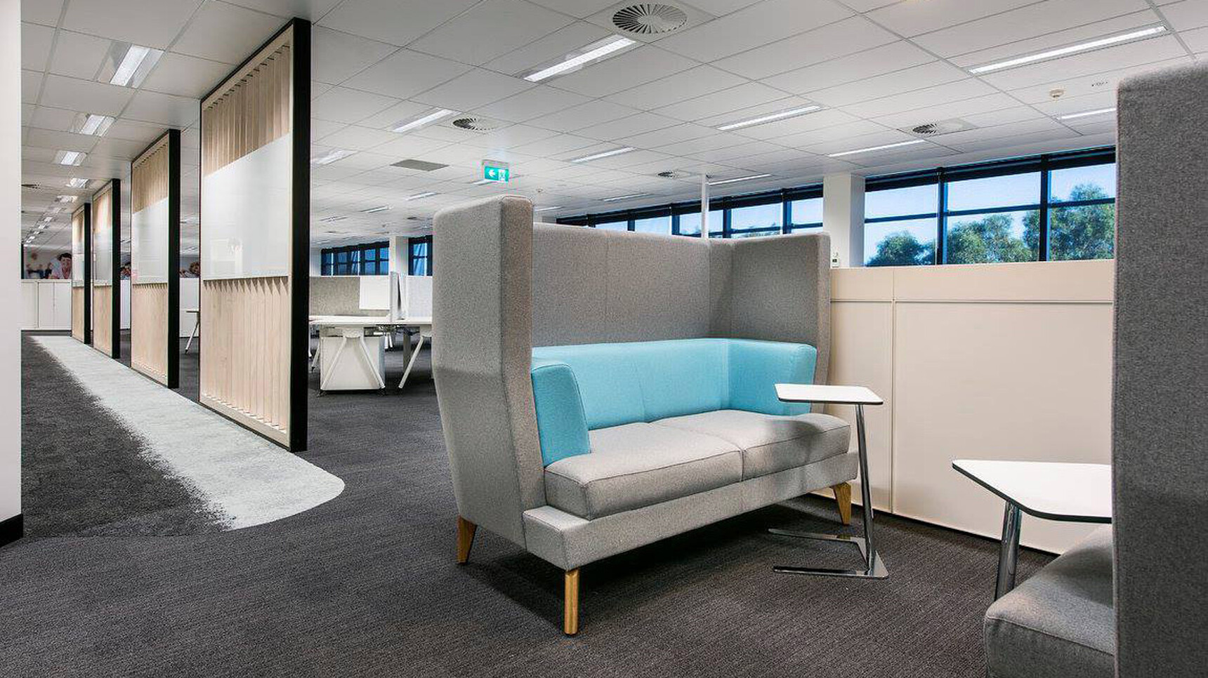 Two Entente Two Seater High-Back Sofas Blue Lumbar In Office Setting