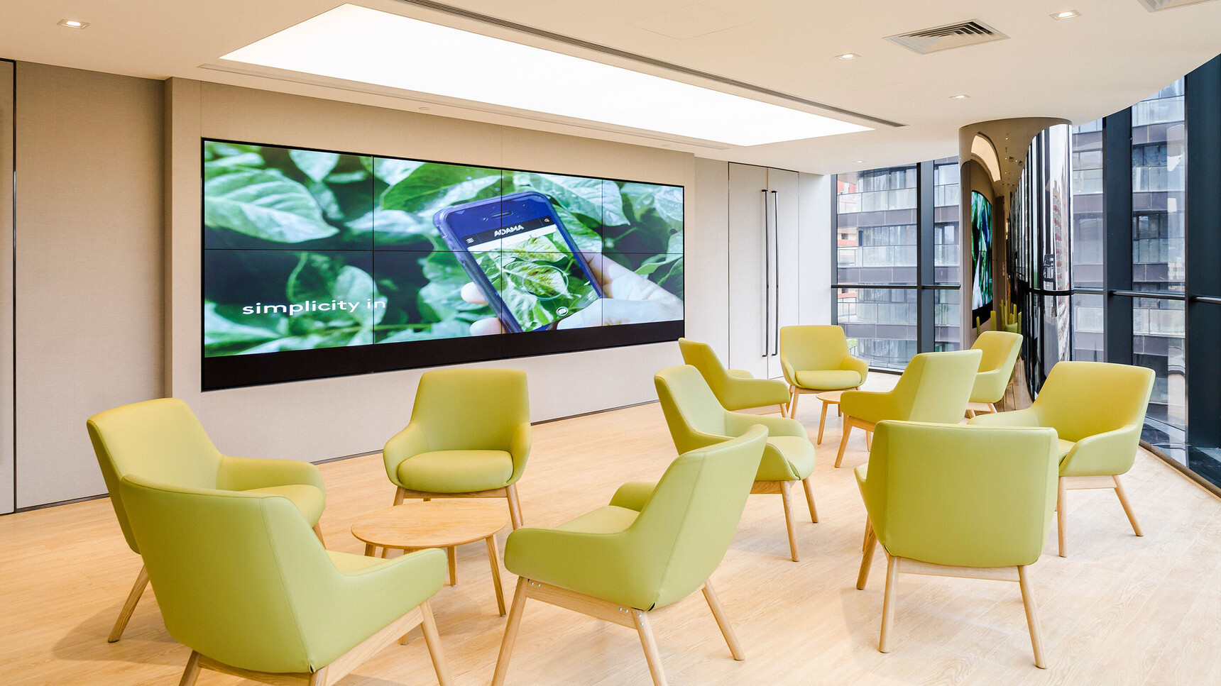 Boss Design Marnie Mid Back Wood Base Lounge Chairs Green Upholstery In Office Environment