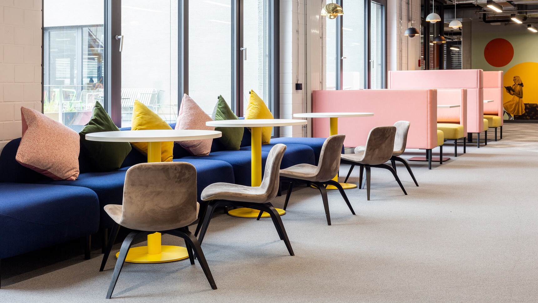 Workstories Pedestal Round Café Tables With Round Base White Top Yellow Base In Office Setting