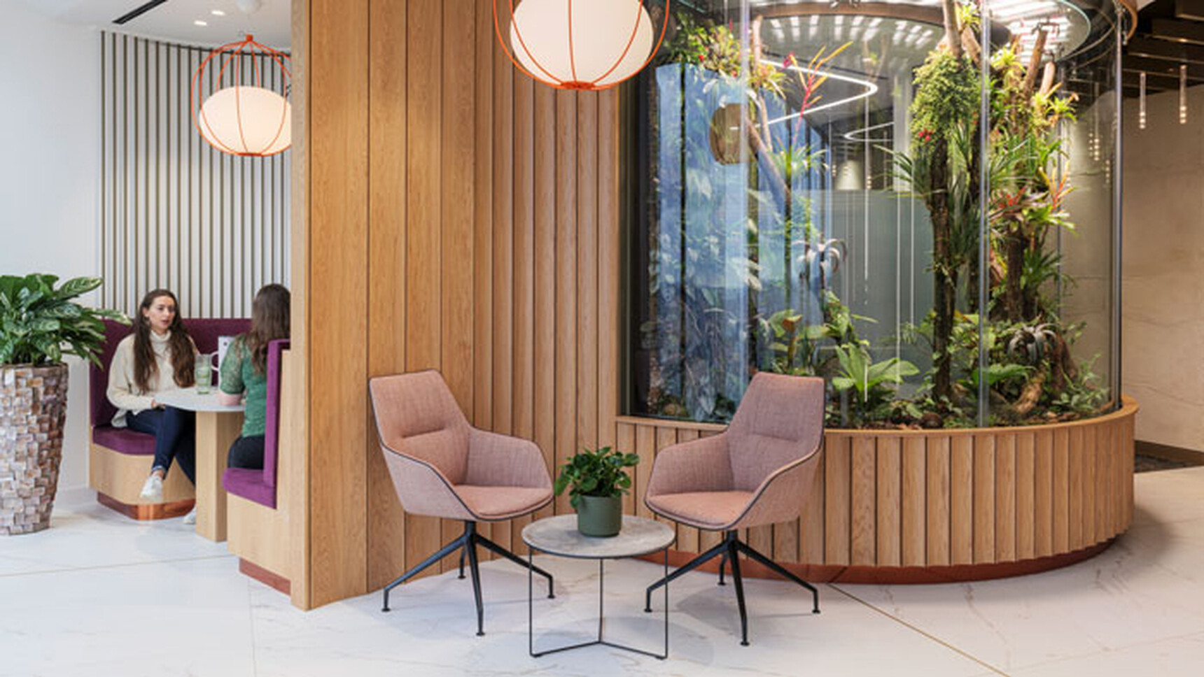 Brunner Ray Soft Swivel Mid Back Chair With Integrated Arms Four Star Base On Glides In Office Setting