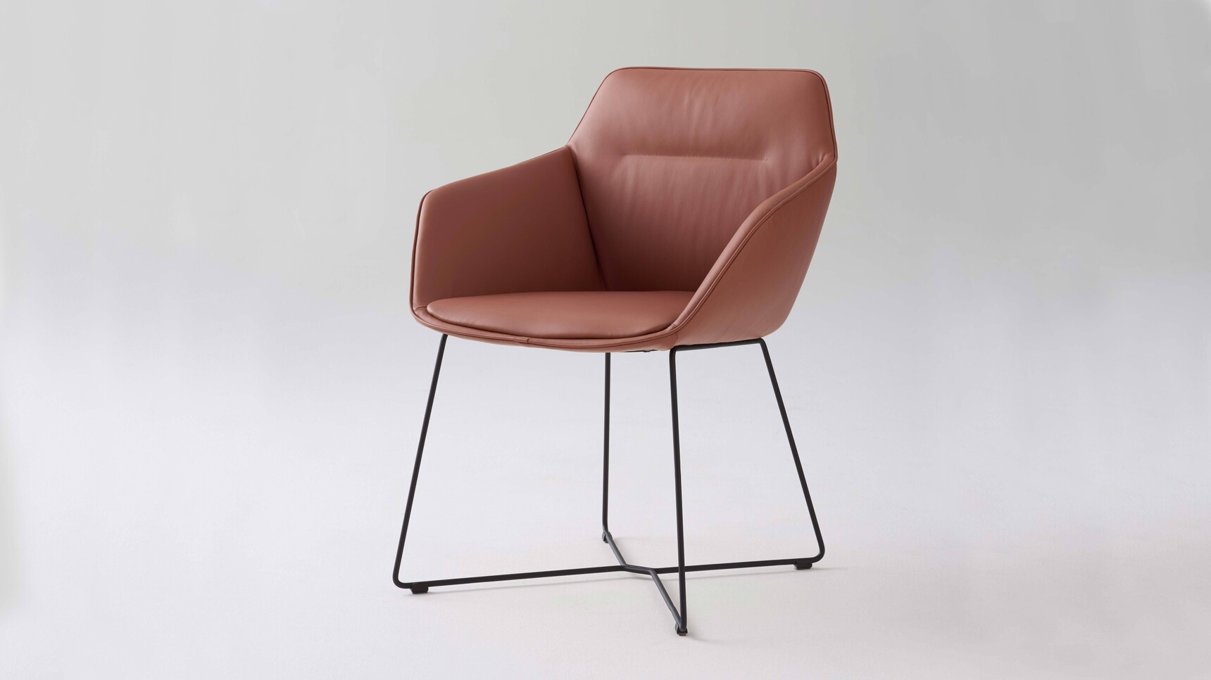 Brunner Ray Soft Swivel Low Back Chair With Integrated Arms | Sled Base 9614A Leather Family Image