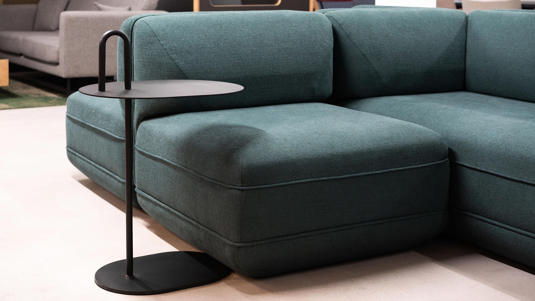 Workstories Loop Laptop Table Black Finish At Sofa In Office Setting