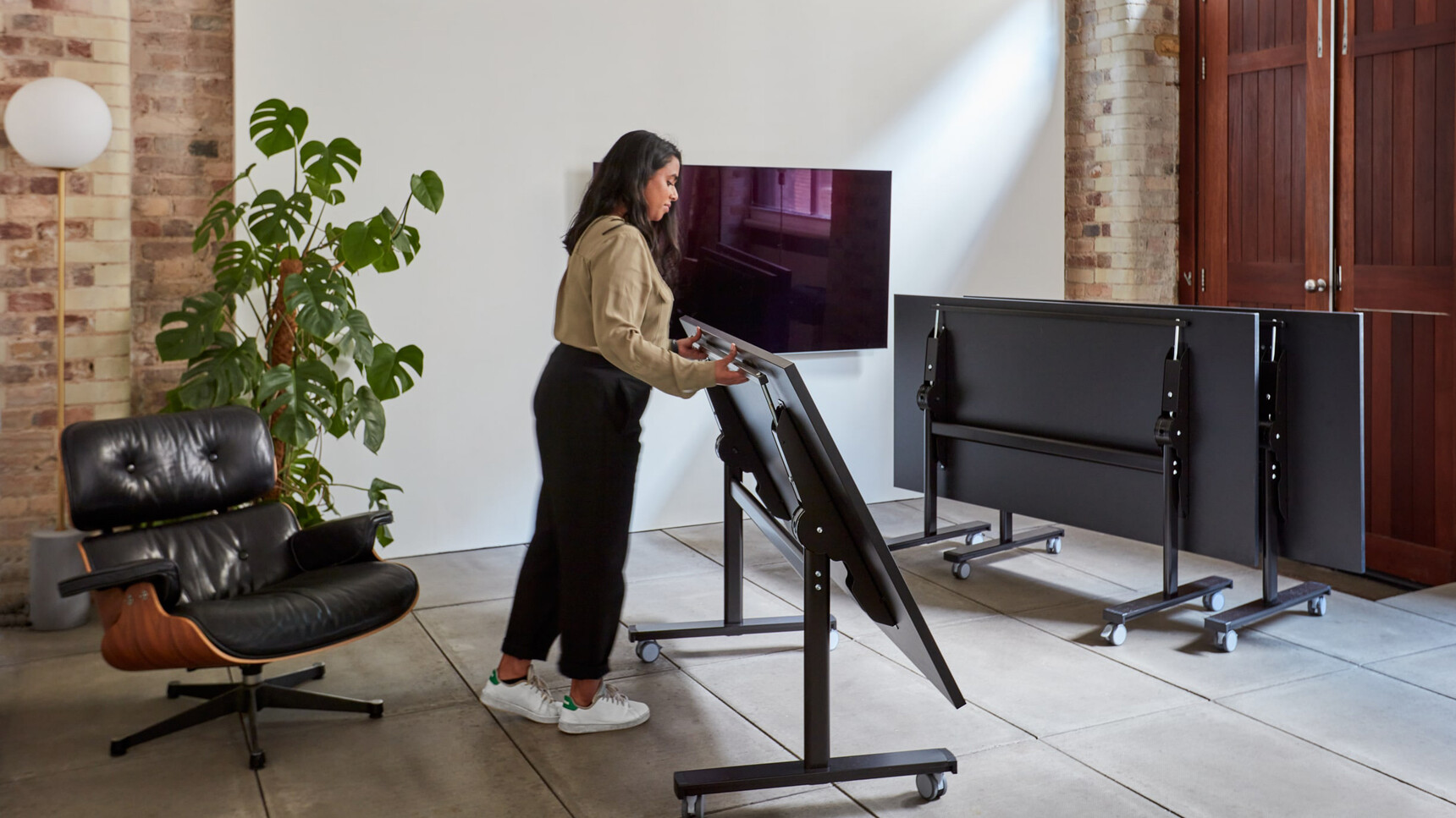 Workstories Three FlipTop Meeting Tables Black Finishes With Eames Family Image