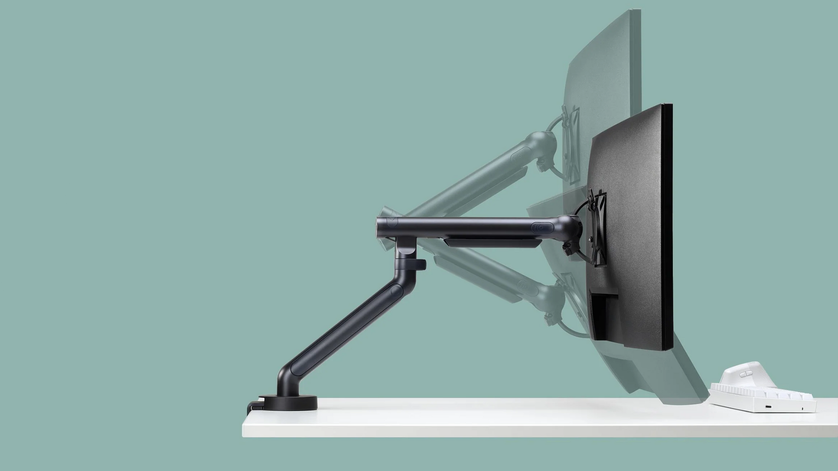 CBS Flo Single Monitor Arm Black Finish On Desk Family Image