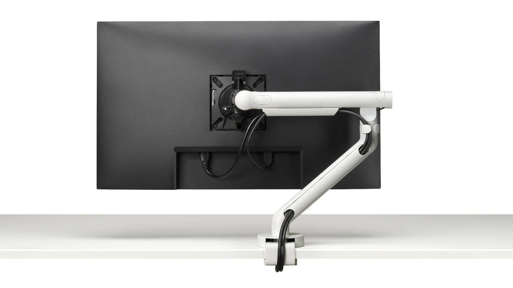 CBS Flo Single Monitor Arm White Finish On Desk Family Image