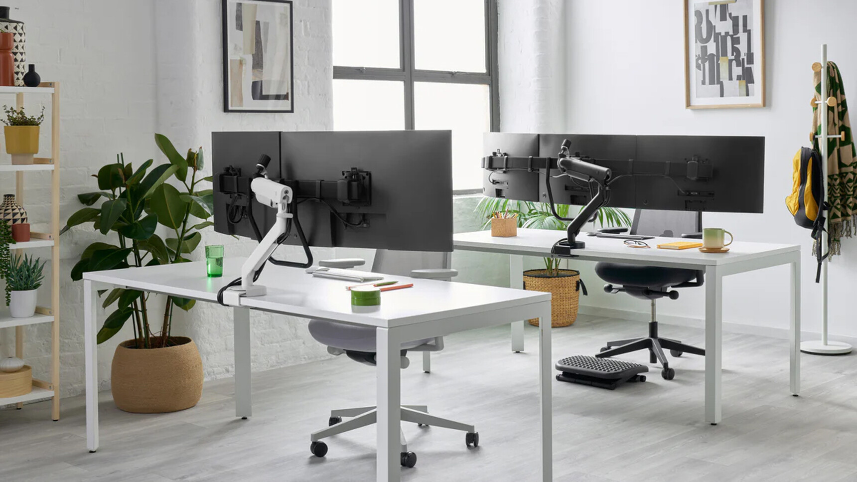 CBS Flo X Multi Monitor Arm Dual Monitor White Finish On Desk & Triple Monitor Black Finish In Office Setting