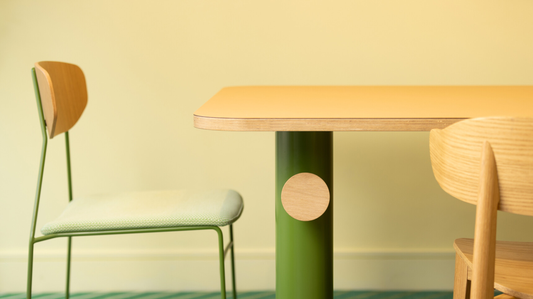 Deadgood Branch Meeting Table Wood Top Green Leg Detail Image