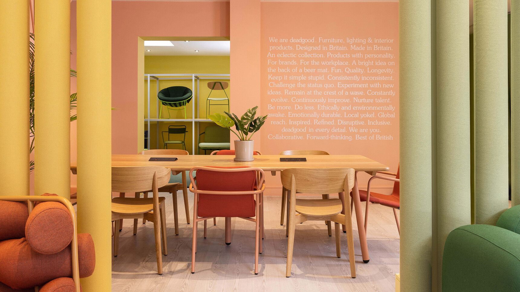 Deadgood Hug Chairs With Setter Meeting Chairs At Table In Showroom Setting