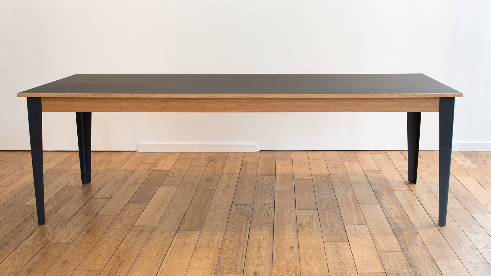 Deadgood Tree Table | X-Large Forbo Nero Top Black Leg Family Image