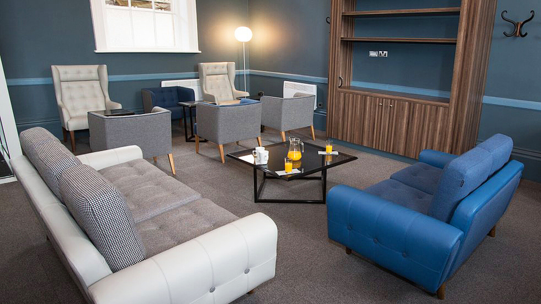 Deadgood Turn Coffee Table Smoked Glass Top With Harvey Sofa In Office Environment