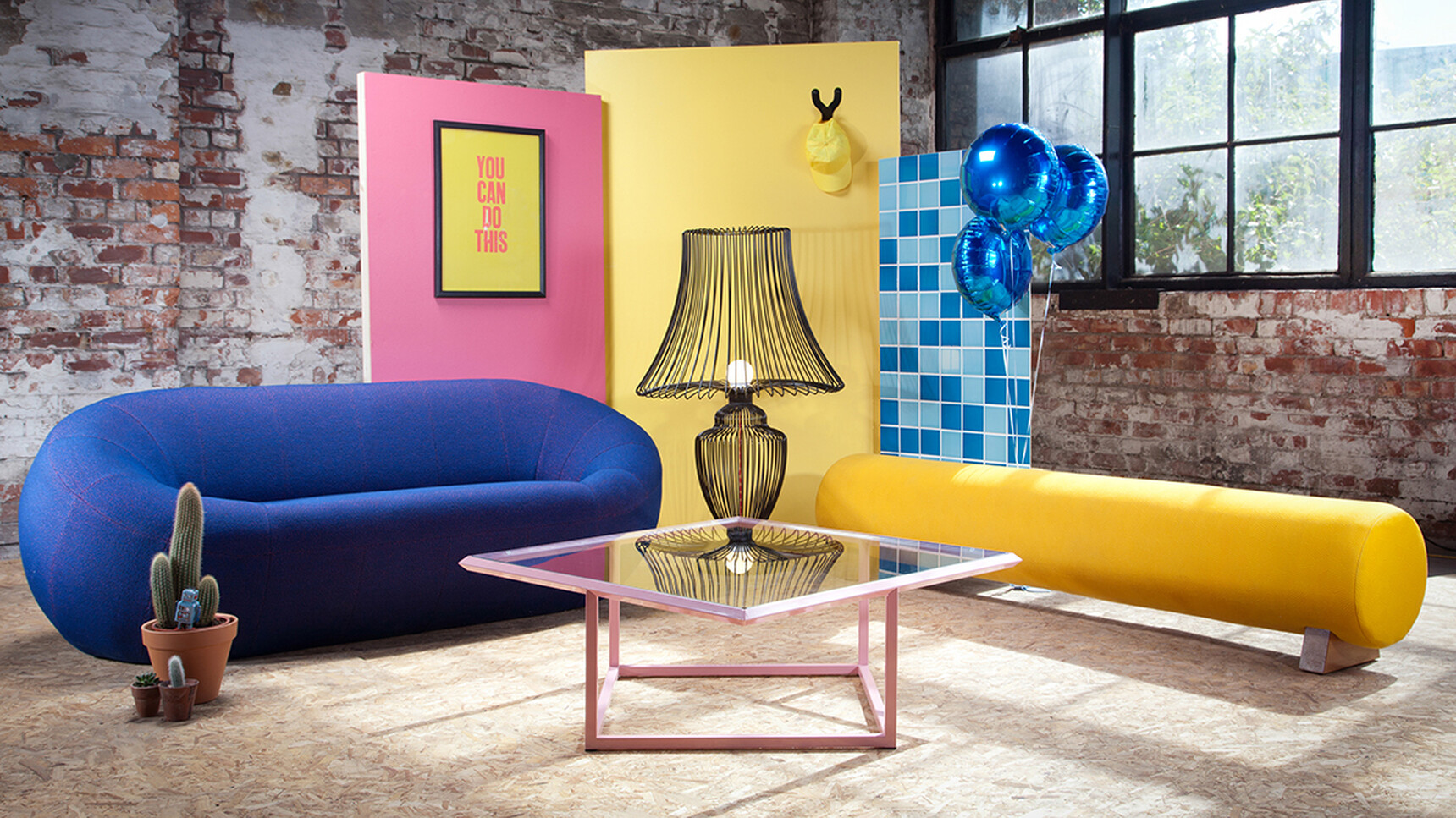 Deadgood Wire Lamp | Large Black Frame Finish On Turn Table With Capsule Sofa In Situ