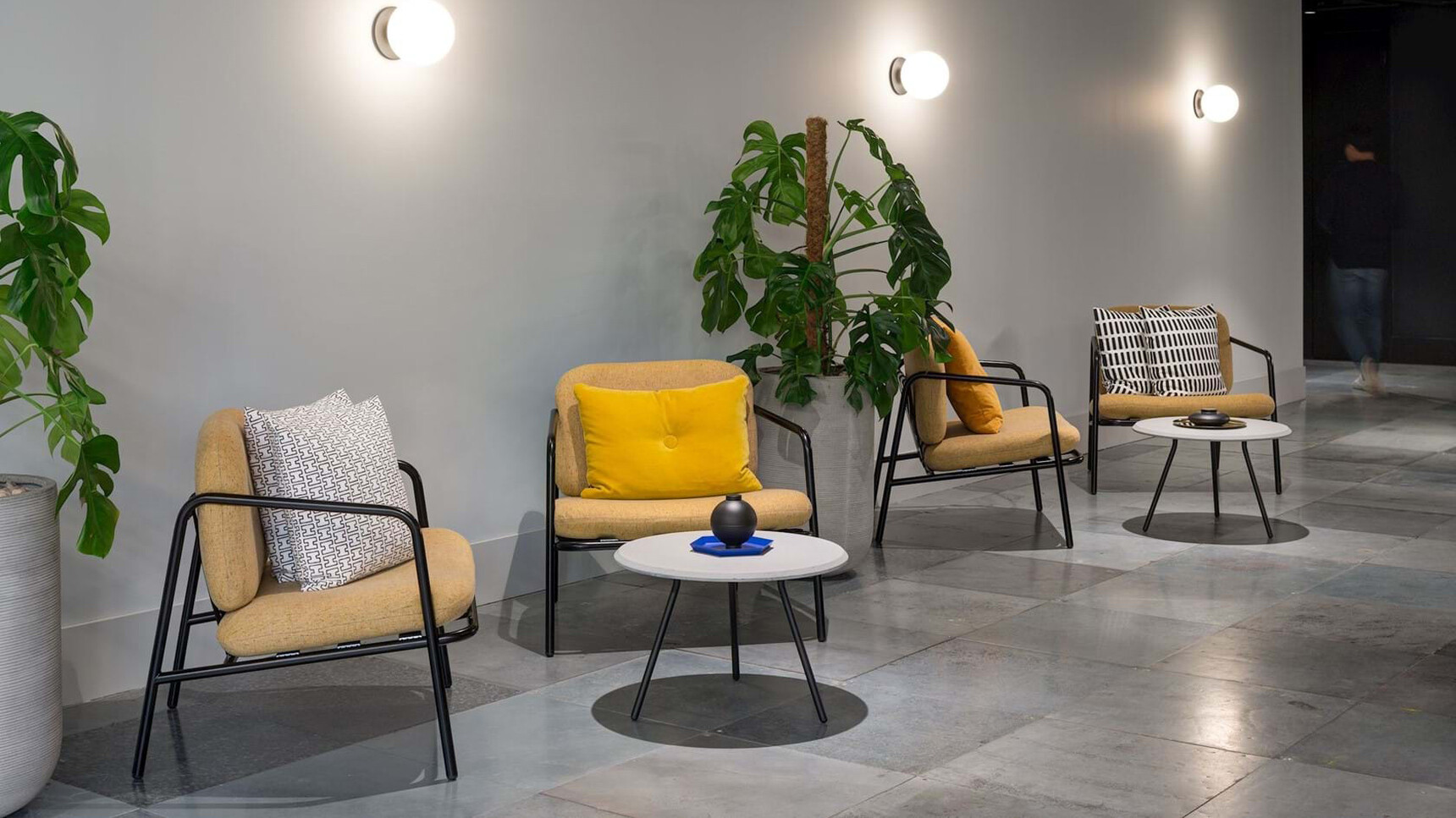 Deadgood Four Working Lounge Armchairs Yellow Upholstery Jet Black Finish Frame In Lounge Setting