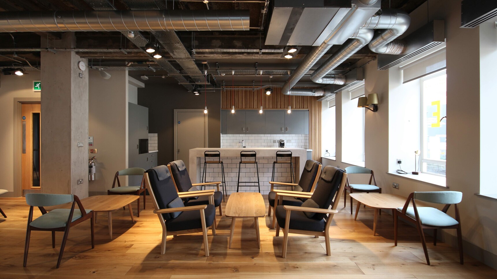 Deadgood Working Cross Stools At Bar In Office Setting