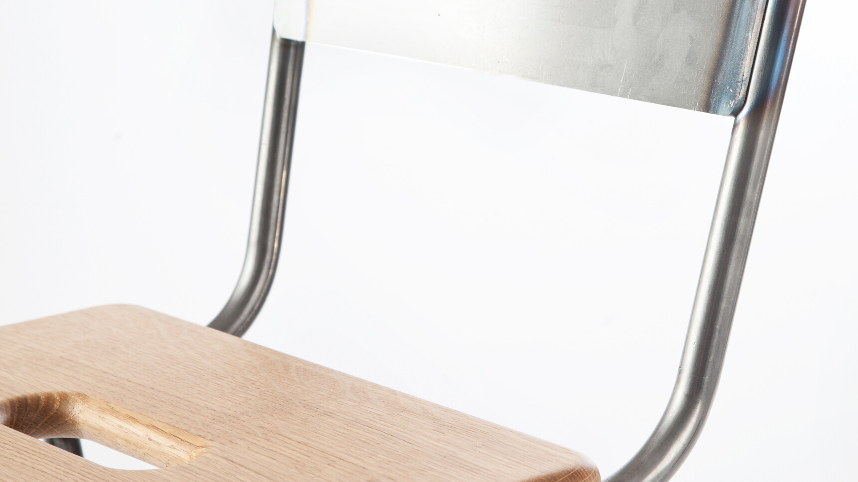 Deadgood Working Cross Stool Raw Frame At Table Detail Image