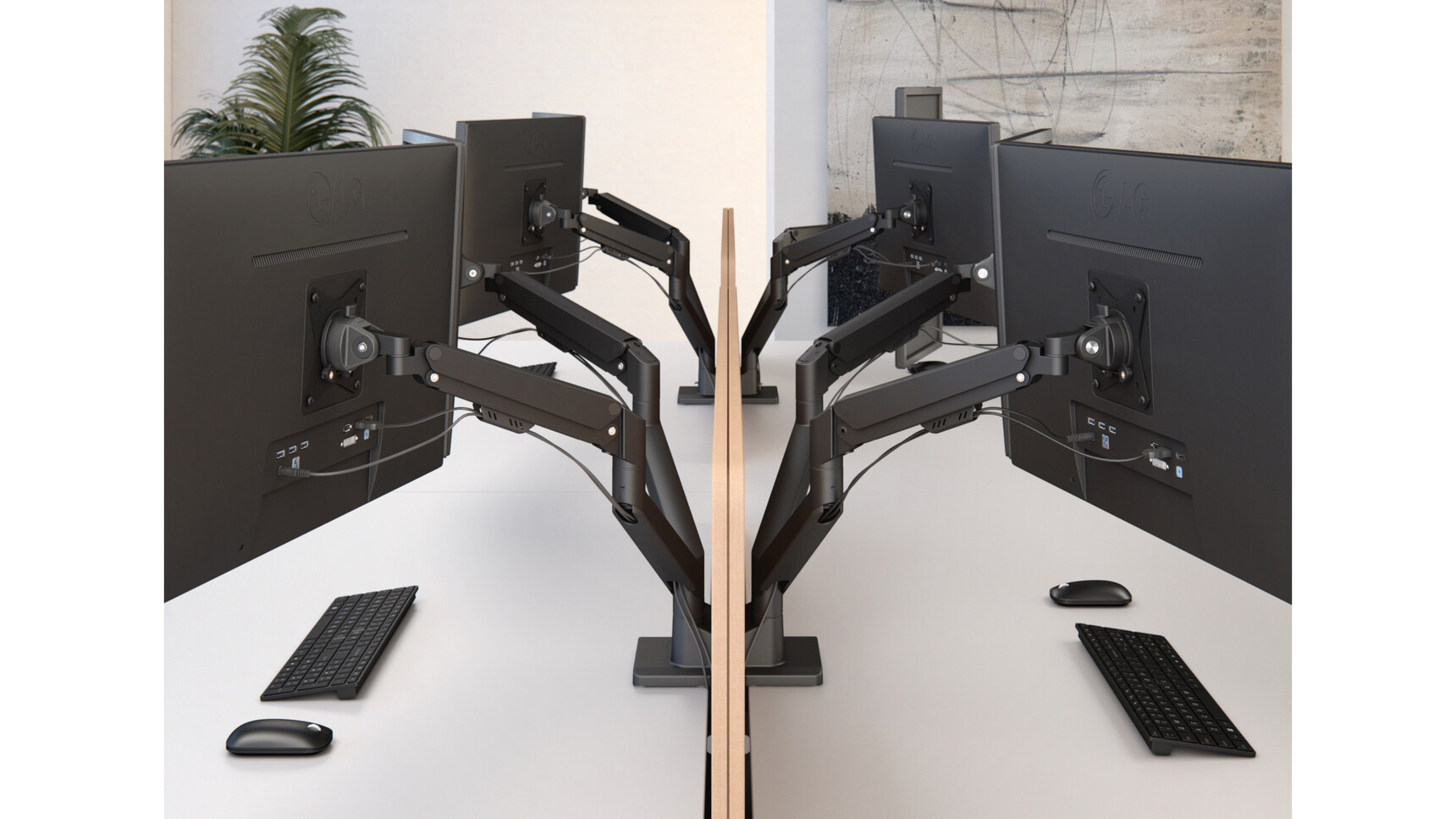 Elite Maya Dual Monitor Arms Black Matt Finishes With Four Monitors On Bench Desk