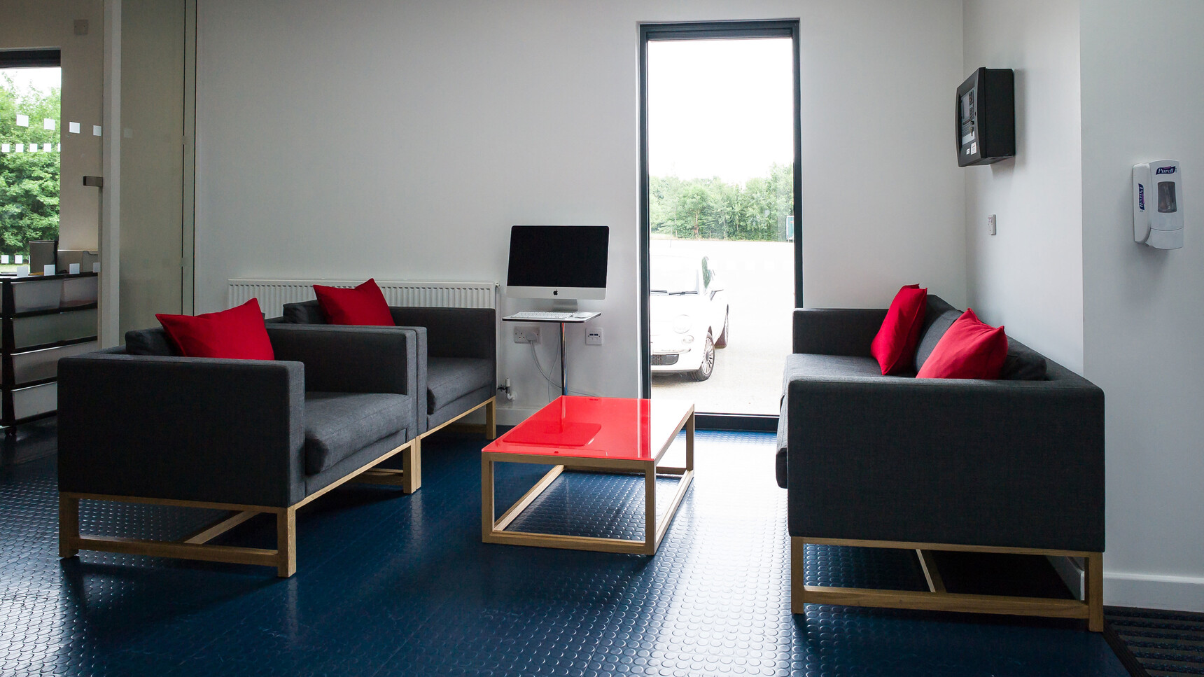 Boss Design Metro Large Rectangular Coffee Table With Red Glass Table Top And Wood Finish At Chairs And Sofas