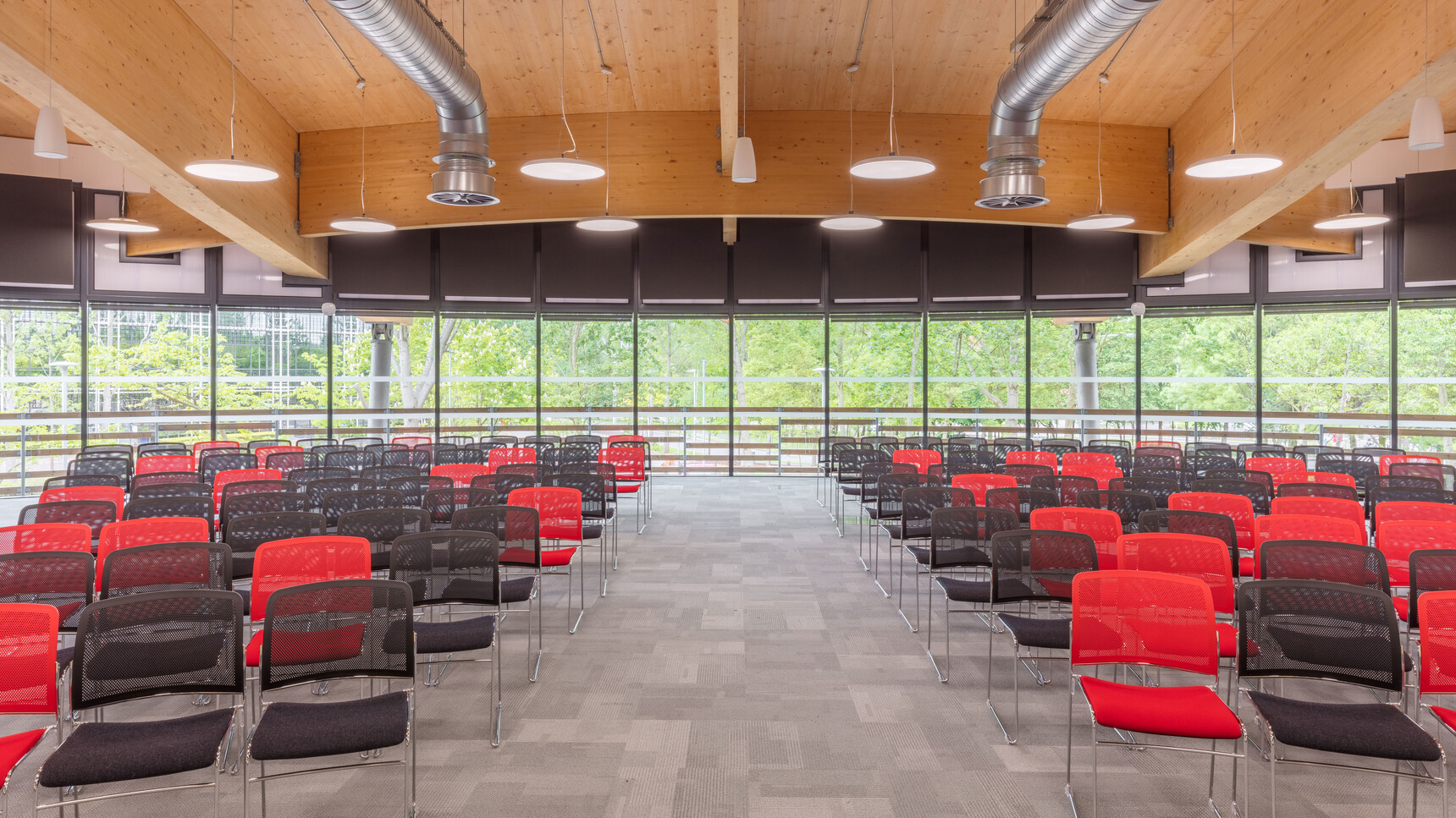 Various Boss Design Starr Armless Meeting Chairs In Red And Black Upholstery And Chrome Base Conference Setting