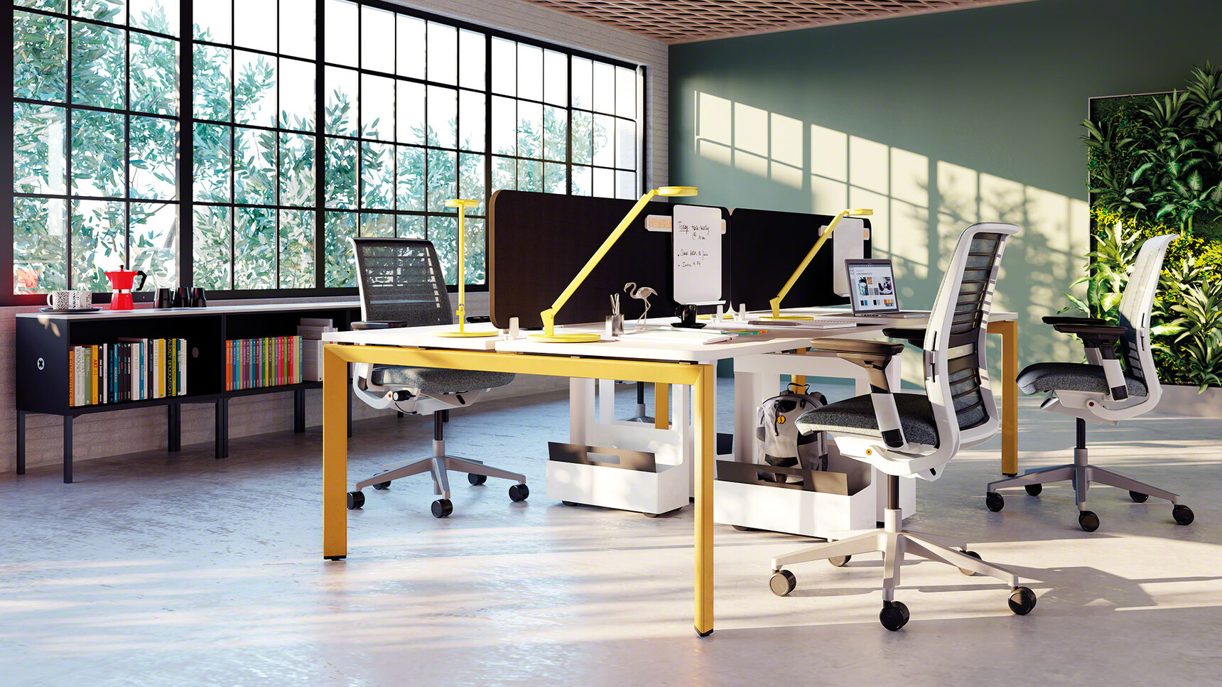 Two Steelcase Frameone Bench Desks For Two With Yellow Free Standing Legs And White Table Top With Four Think 3D Knit Back Office Chairs In Grey In Office Environment