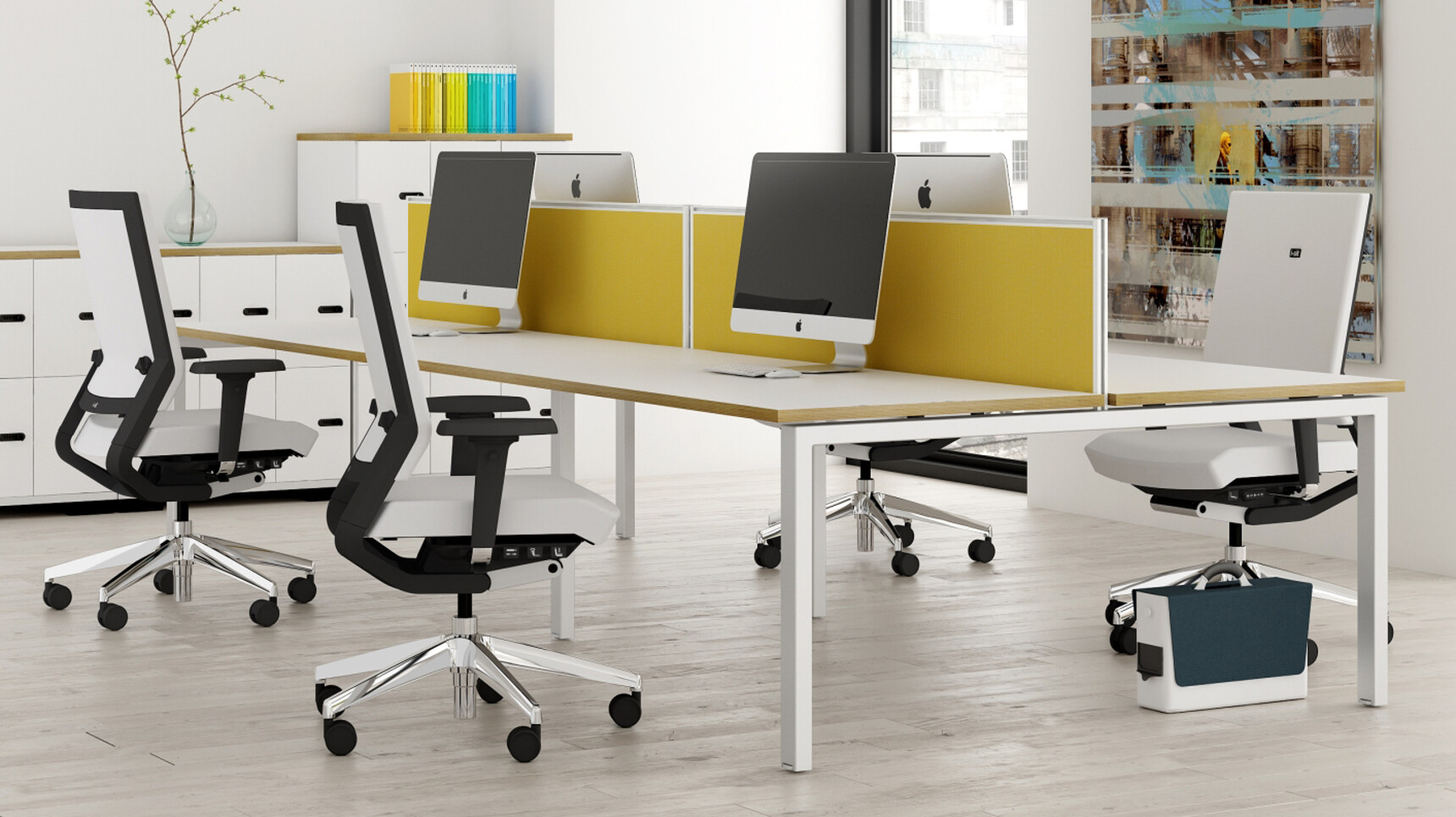 Elite Linnea Double Bench Desk With White Table Top Finish And White Metal Leg Finish With Four White Elite Task Chairs At Desks In Office Environment