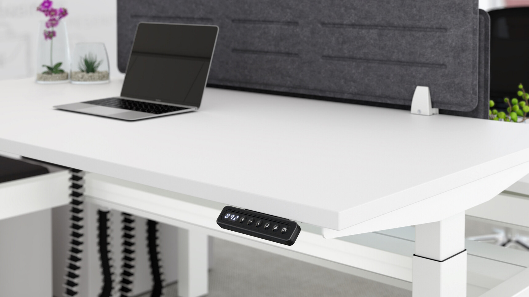 Two Elite Progress Plus Electric Height Adjustable Desk With White Table Top Finish And White Metal Leg Finish With Two Grey Privacy Screens And Advanced Keyboard Close Up