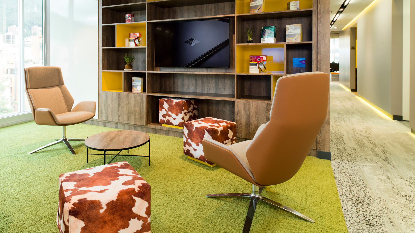 Two Boss Design Kruze Lounge High Back Chairs Brown Chair Frame And White And Yellow Upholstery And Polished Aluminium Base At Coffee Table And Three Cow Patch Stools