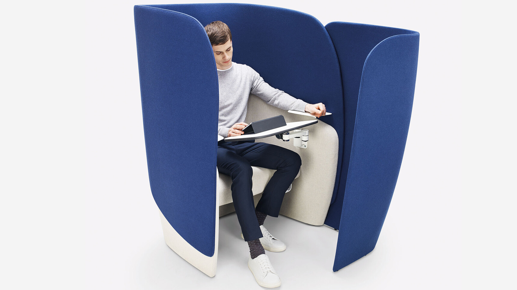 Boss Design Mango Workstation with Surround Screen Blue White Upholstery Left-Hand Writing Tablet Articulated Steel Arm In Use