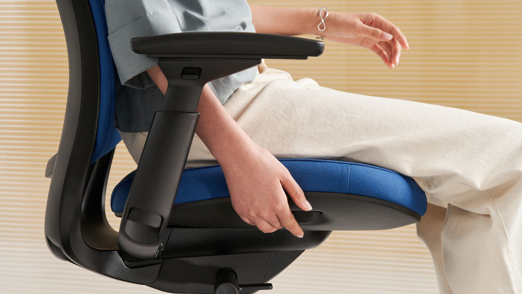 Series 2 Office Chair In Blue Upholstery In Use Showing Adjustability Detail Image