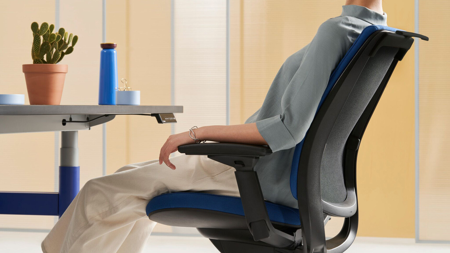 Steelcase Steelcase 2 Office Chair With Blue Upholstery With Black Frame And Back Fabric In Use Detail Image