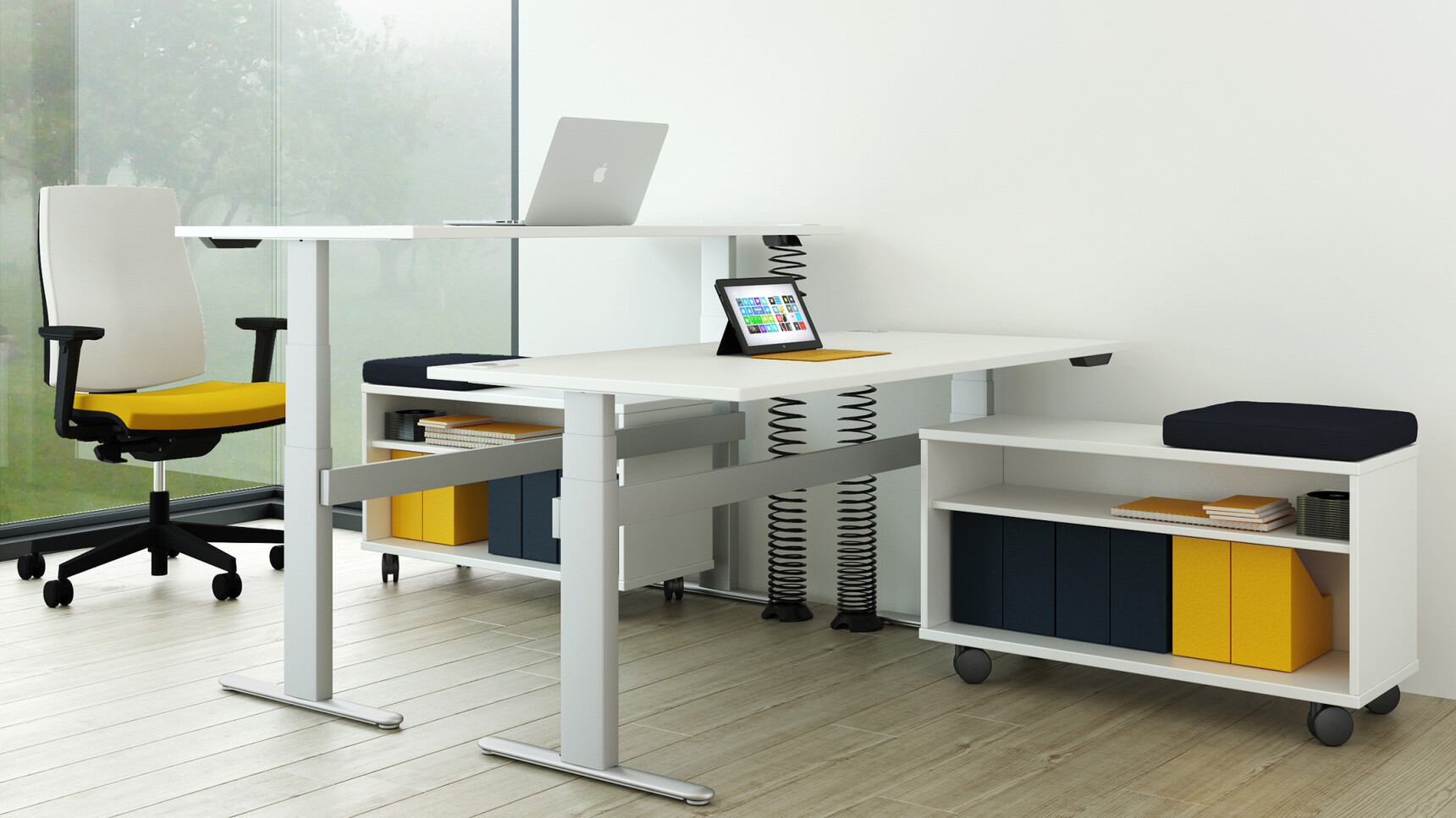 Elite Double Sided Under Desk Mobile Storage Unit With Pad With White Finish And Black Pad With Two Progress Plus Electric Height Adjustable Desks With White Finish And Grey Legs